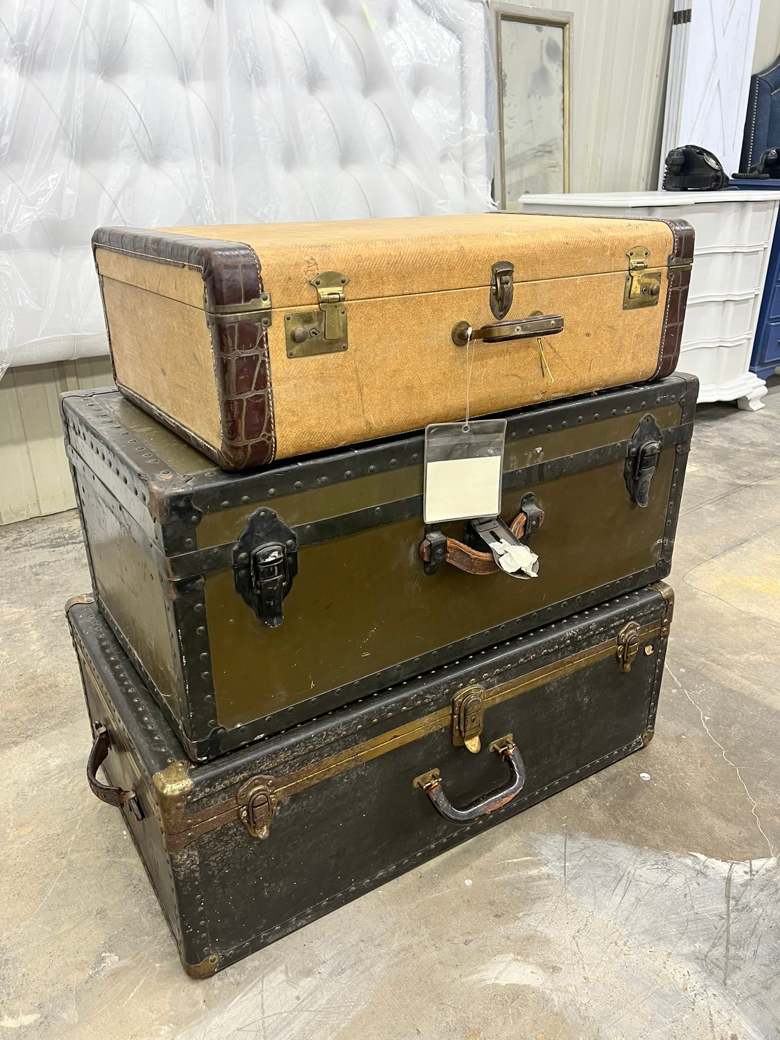 Stack of Three Vintage Steamer Trunks