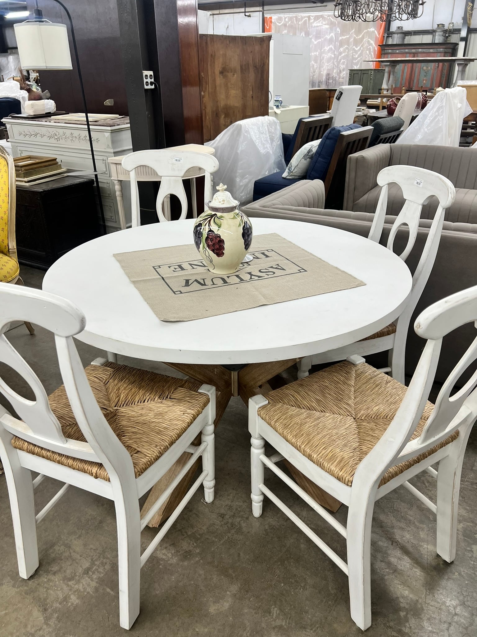 White Round Pedestal Dining Table with Rush-Seat Chairs